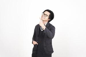 A man in glasses and a jacket is pointing up photo