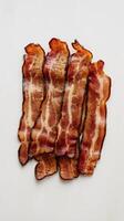 Slices of bacon on a white background photo