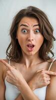 A woman with a surprised look on her face photo