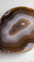 Macro mineral stone agate on a white background photo