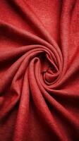 Closeup texture of natural red or pink fabric or cloth in same color fabric texture of natural cotton silk or wool or linen textile material red and orange canvas background photo
