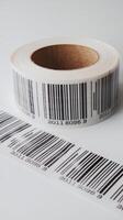 A roll of barcodes on a white surface photo