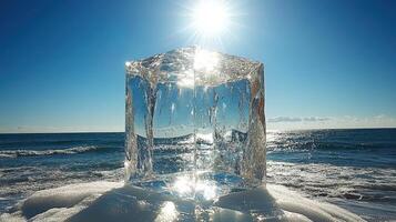 Sparkling ice cube on frozen coast, sunny day, winter photo