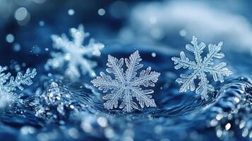 Snowflakes floating on water, winter scene, nature background, holiday card photo