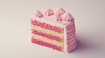 A slice of pink cake with frosting on it photo