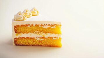 A piece of cake with frosting on top photo