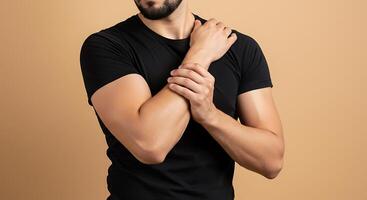 A man applies self-massage to his arm muscles on a peach backdrop - Generated using AI photo