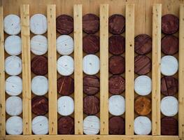 Wooden game Connect Four known as Connect four, Four Up, Plot Four, giant figures without people photo