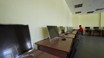 Multimedia classroom with computers. Computer room neatly placed for student in computer lab video