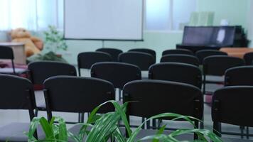 Empty classroom with chairs. Empty classroom with tables and chairs video