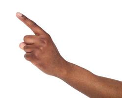 Black male hand point finger. Hand gestures - man pointing on virtual object with forefinger, isolated on white background photo
