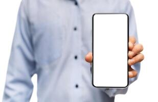 Modern smartphone with blank screen in hands of unrecognizable man, selective focus on device, closeup photo