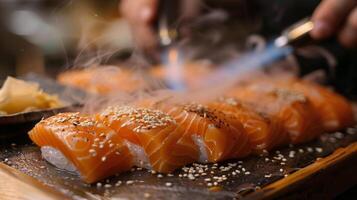 A skilled sushi chef holds a torch to sear salmon nigiri while preparing a dish in a bustling restaurant, showcasing culinary artistry and attention to detail in the evening ambiance. photo