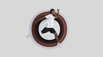 Dynamic image of an African American man captured in a mid-air running pose against a stark grey background, illustrating motion and athleticism photo