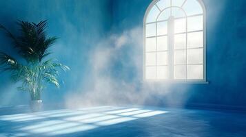 Blue room with light streaming in. Window on the right and potted plant on the left side. Mist in the air and sunlight on the floor. photo