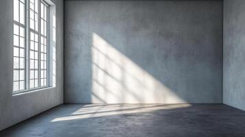 A minimalist room featuring a concrete wall and sunlight streaming through a window, casting shadows that emphasize the space's simplicity. photo