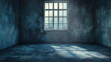 Empty blue hued grunge room interior with sunlight streaming through the window creating an eerie ambiance and highlighting the textured floor. photo