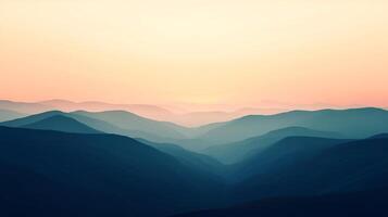 Hazy mountains at sunrise showcasing soft pastel colors as light gradually brightens the landscape, inviting feelings of calmness and contemplation in a natural setting. photo