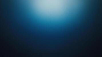 A deep blue background featuring smooth gradients, creating an abstract and tranquil atmosphere that evokes feelings of calmness and introspection. photo