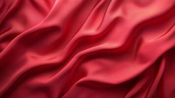 A visually rich image of flowing red satin fabric, elegantly draped to highlight its texture, color, and the luxurious feel of fine textiles. photo