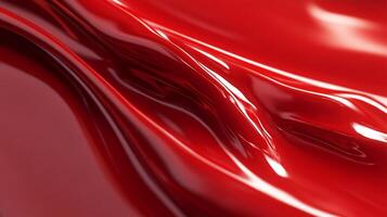 This image features a glossy red surface, flowing gracefully with light reflections that create a sense of movement and vivid color for visual appeal. photo