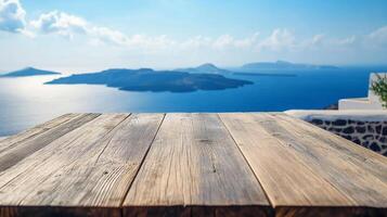 Rustic wooden table overlooking a stunning ocean view with islands dotting the horizon under a bright, partly cloudy sky. Serene scenery photo