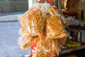 Vietnamese traditional Com Chay made of rice and with Rousong meat floss with eggs and fish sauce on street food in Nha Trang photo