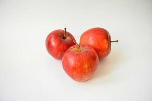 Large appetizing red apples isolated on a white background photo