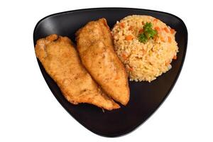 Mexican fried chicken filet with rice isolated on a white background top view photo