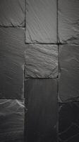 Dark grey black slate background or texture black granite slabs background photo