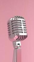 Silver retro microphone on a pink background minimal style 3d rendering photo