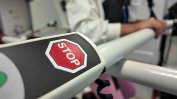 Close-up of a stop sign on an exercise machine in a gym setting video