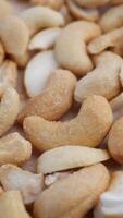 Cashew nuts and other nuts displayed together on a table video