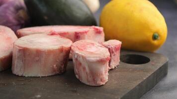 Preparing flavorful bone marrow with fresh vegetables and lemon video