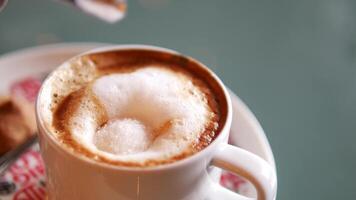 Enjoying coffee preparation with steaming technique at local cafe video