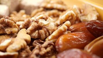 Nut and date platter preparation for healthy snacking video