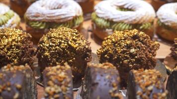 Delicious pastries displayed in a bakery with vibrant colors video