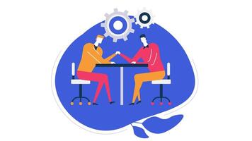 Two people sitting at a table with gears on it video