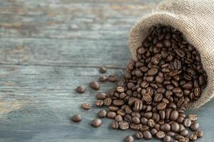 Roasted coffee beans spilling from a burlap sack onto a rustic wooden table. Aromatic delight photo