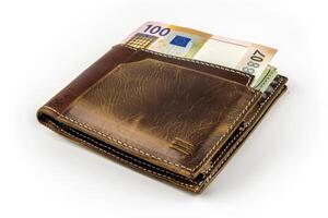 Close-Up of Wallet Filled with Euro Bills Isolated on White Background photo