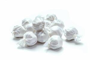Irresistible White Candy Assortment Isolated on White Background photo