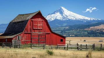 Traditional American farm with a red wooden barn. Old red barn in rural photo