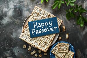 Matzah crackers with the phrase Happy Passover spell out a greeting for the Jewish holiday photo