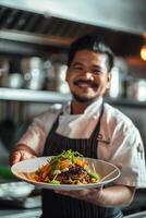 A smiling chef in uniform holds up an exquisite dish, smiling at the camera. The background is a restaurant interior. Generated by artificial intelligence. photo