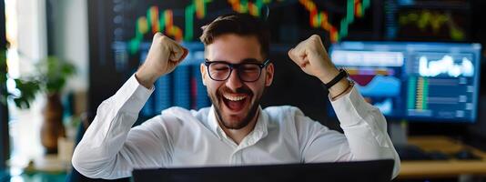 Business Analyst Celebrating Successful Completion of Project on Laptop in Modern Office Workspace photo