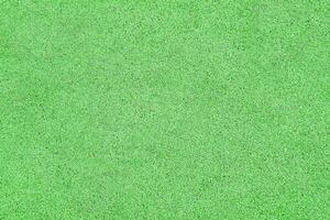 Green rubber crumb surface as texture, background photo