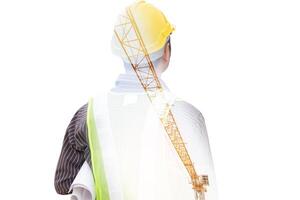 Double exposure image of professional engineer in protective helmet and blueprints paper at building construction site photo