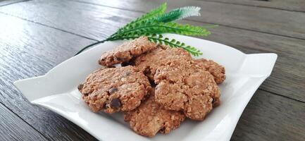 Homemade healthy Oatmeal crunchy cookies on a plate photo