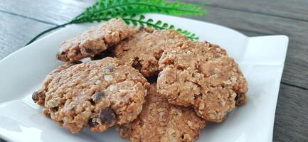Homemade healthy Oatmeal crunchy cookies on a plate photo