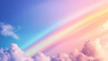 A serene sky with a rainbow and soft clouds at sunset. photo